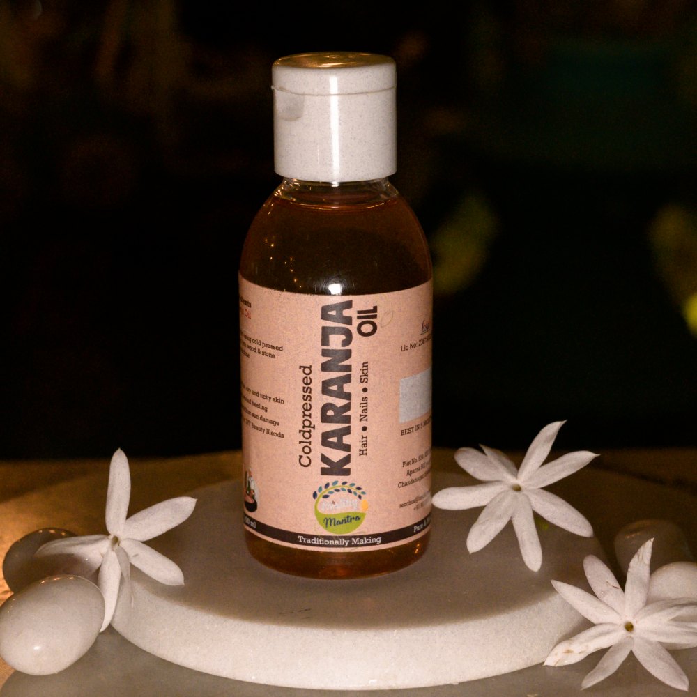 Karanja oil bottle with white flowers